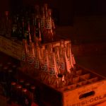 Empty labelled glass bottles